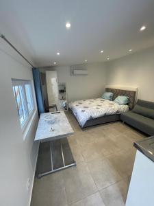 Sejours chez l'habitant Studette independante tout confort sur jardin : photos des chambres