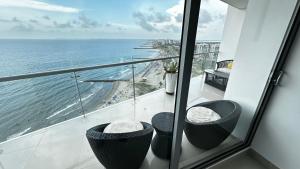 Front beach apartment close to the Cartagena letters