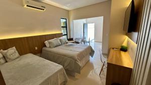 Apartamento nº 1, Novo, 300m do Beto Carrero, a 600m da Praia, cozinha completa, mobiliado com 1 quarto e estacionamento privativo