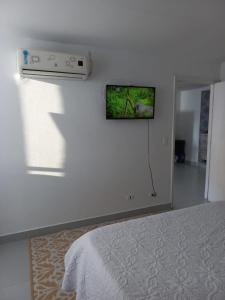 1C-AL3E APARTAMENTO DE 1 ALCOBA CERCA AL MAR CON AIRE ACONDICIONADO, PISCINA Y WIFi