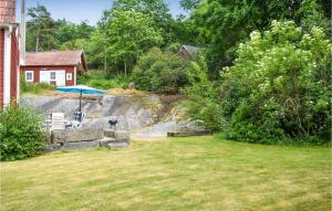 Three-Bedroom Holiday Home Bräkne-Hoby With A Fireplace 05