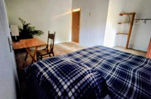 Casa pájaros- Habitacion Quetzal