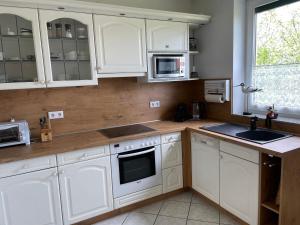 Ferienhaus Amare mit Fasssauna, eigener Terrasse & Kamin