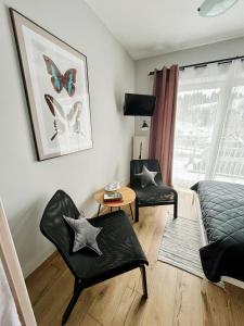 Villa Wesoła pokoje z łazienkami i dostępem do kuchni w centrum Krynicy Zdroju Bezpłatne miejsca postojowe