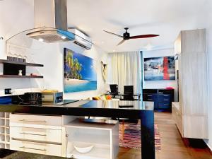 Executive 1 bedroom-Suite with pool, air conditioning, roof top, -Hyper Center Playa Del Carmen-