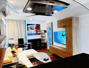 Executive 1 bedroom-Suite with pool, air conditioning, roof top, -Hyper Center Playa Del Carmen-