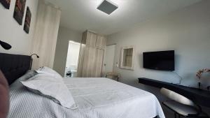 Flat em Hotel com piscina, garagem, Wi-fi e Limpeza diária