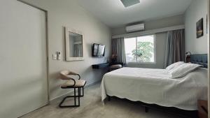 Flat em Hotel com piscina, garagem, Wi-fi e Limpeza diária