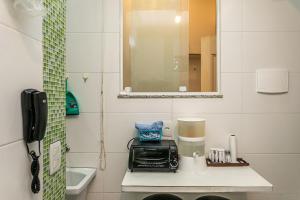 Copacabana: Praia, Conforto e Charme para 4