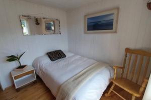 Casa soleada para cuatro personas, con patio, hamaca y parrilla