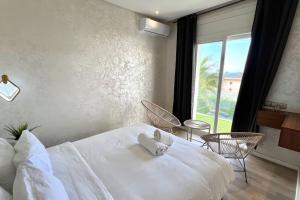 N9 Appartement pied sur mer, La Corniche Rabat