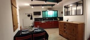 Appartements O-Coeur de la Roche - Jacuzzi et Hammam privatif : photos des chambres