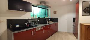 Appartements O-Coeur de la Roche - Jacuzzi et Hammam privatif : photos des chambres