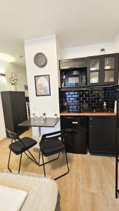 Studio 45 Arche Défense et Salle Arena Parking gratuit wifi haut débit