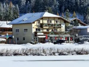 Wohlfühl-Appartement Bergsee FAMILY - am Wildsee - SUP und Schlitten for free - Auland