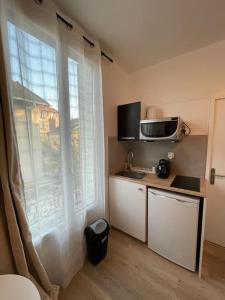 Appartements Studio cosy 10min de Paris & CDG : photos des chambres
