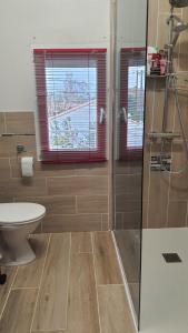 Sejours chez l'habitant Les Chambres des 4 Vents - Chambres doubles a l-etage : Chambre Double - Vue sur Jardin
