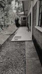 Riverside Haven 4BR Modern Home with Private Serene Compound