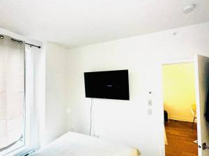 Condo chambre , Salon , centre-ville, gym