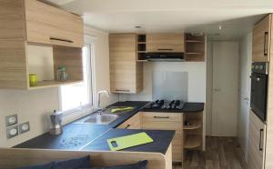 Campings EA - Votre sejour detente, 3 ch, 2 SDB, proche plages et parc aquatique : photos des chambres