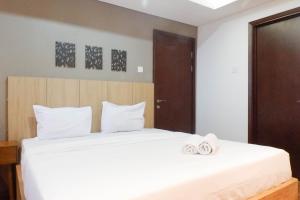 3BR Luxurious and Elegant Apartment at Grand Sungkono Lagoon By Travelio