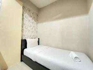 Cozy 2BR Apartment at Pinewood Jatinangor By Travelio