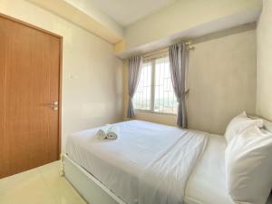 Cozy 2BR Apartment at Pinewood Jatinangor By Travelio