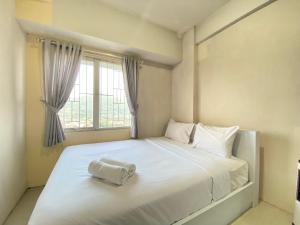 Cozy 2BR Apartment at Pinewood Jatinangor By Travelio