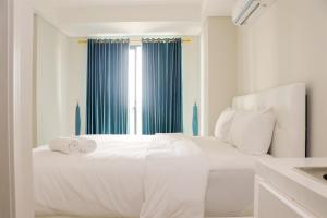 Elegant and Comfy Studio at Daan Mogot City Apartment By Travelio