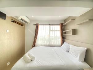 Spacious 1BR Apartment at The Jarrdin Cihampelas near Ciwalk By Travelio