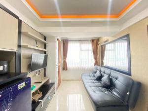 Spacious 1BR Apartment at The Jarrdin Cihampelas near Ciwalk By Travelio