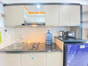 Spacious 1BR Apartment at The Jarrdin Cihampelas near Ciwalk By Travelio