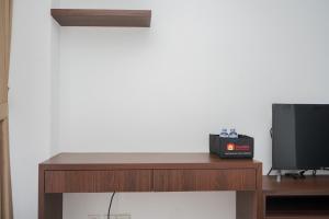 Comfort and Warm Studio Room Apartment at M-Town Residence By Travelio