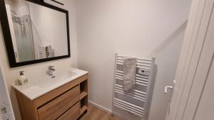 Appartements Les Chalets de SAUMUR, Piscine & Parc boise, 100m du CadreNoir : photos des chambres