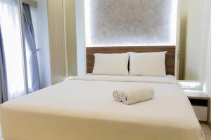 Modern and Clean 2BR Apartment at M-Town Residence By Travelio