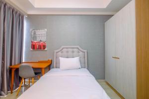 Comfy and Cozy 2BR at Menteng Park Apartment By Travelio