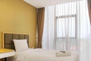 Spacious and Nice 2BR at LAvenue Apartment Pancoran By Travelio