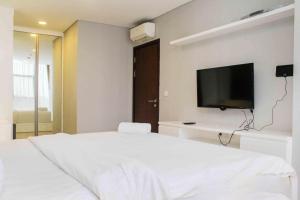 Spacious and Nice 2BR at LAvenue Apartment Pancoran By Travelio