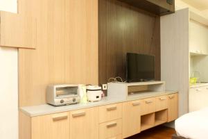 Comfort Studio Apartment at Metropark Condominium Jababeka By Travelio