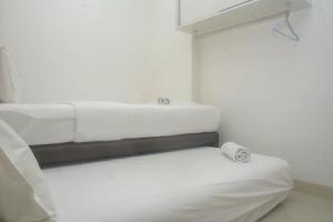Cozy and Tidy 2BR at Signature Park Grande Apartment By Travelio
