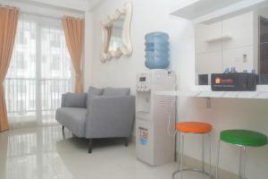 Cozy and Tidy 2BR at Signature Park Grande Apartment By Travelio