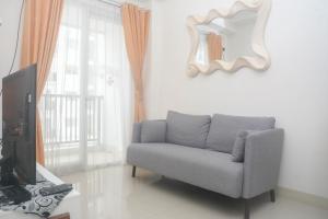 Cozy and Tidy 2BR at Signature Park Grande Apartment By Travelio