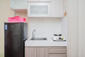 Cozy and Comfort Living 1BR Apartment at M-Town Residence By Travelio