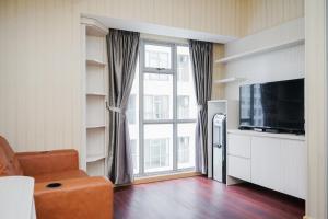 Cozy and Comfort Living 1BR Apartment at M-Town Residence By Travelio