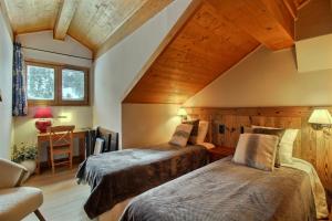 ARC 1950 - Appartement 8 personnes Duplex Cheminée - ski aux pieds - Sauna, Hammam, Jacuzzi, Piscine