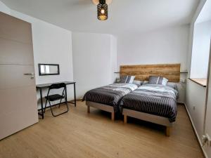 Appartements Gite renove avec parking a proximite de Saint-Die-des-Vosges - FR-1-589-675 : photos des chambres