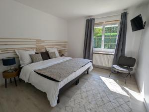 Maisons de vacances Maison spacieuse avec jardin prive et WIFI, proche Epinal - FR-1-589-681 : photos des chambres
