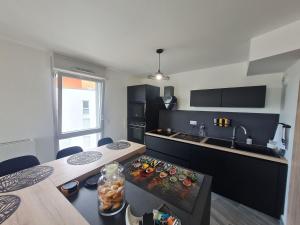 Appartements Appartement contemporain 3 chambres avec vue sur canal, parking et internet a Nancy - FR-1-584-343 : photos des chambres