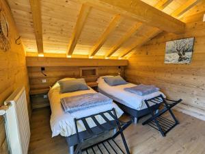Maisons de vacances Chalet au coeur des Vosges avec sauna, terrasse et connexion WIFI - FR-1-589-692 : photos des chambres