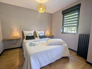 Maisons de vacances Gite spacieux, confort moderne, jardin paisible - FR-1-589-695 : photos des chambres